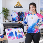 Máy in chuyển nhiệt đang in trang phục thể thao ANGEL